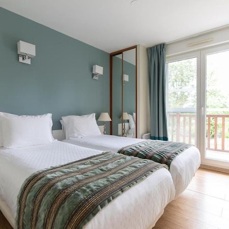 Club Wyndham Normandy Aparthotel คอนเนลเลส์ ภายนอก รูปภาพ
