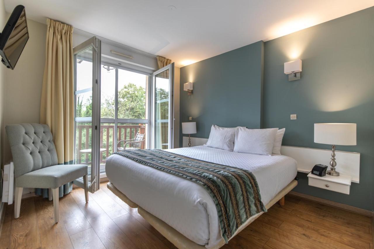 Club Wyndham Normandy Aparthotel คอนเนลเลส์ ภายนอก รูปภาพ